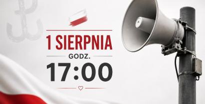 na zdjęciu syrena alarmowa i flaga Polski